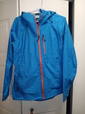 Eastern Mountain Sports Women’s Bright Blue Rain Shell with Orange Zipper